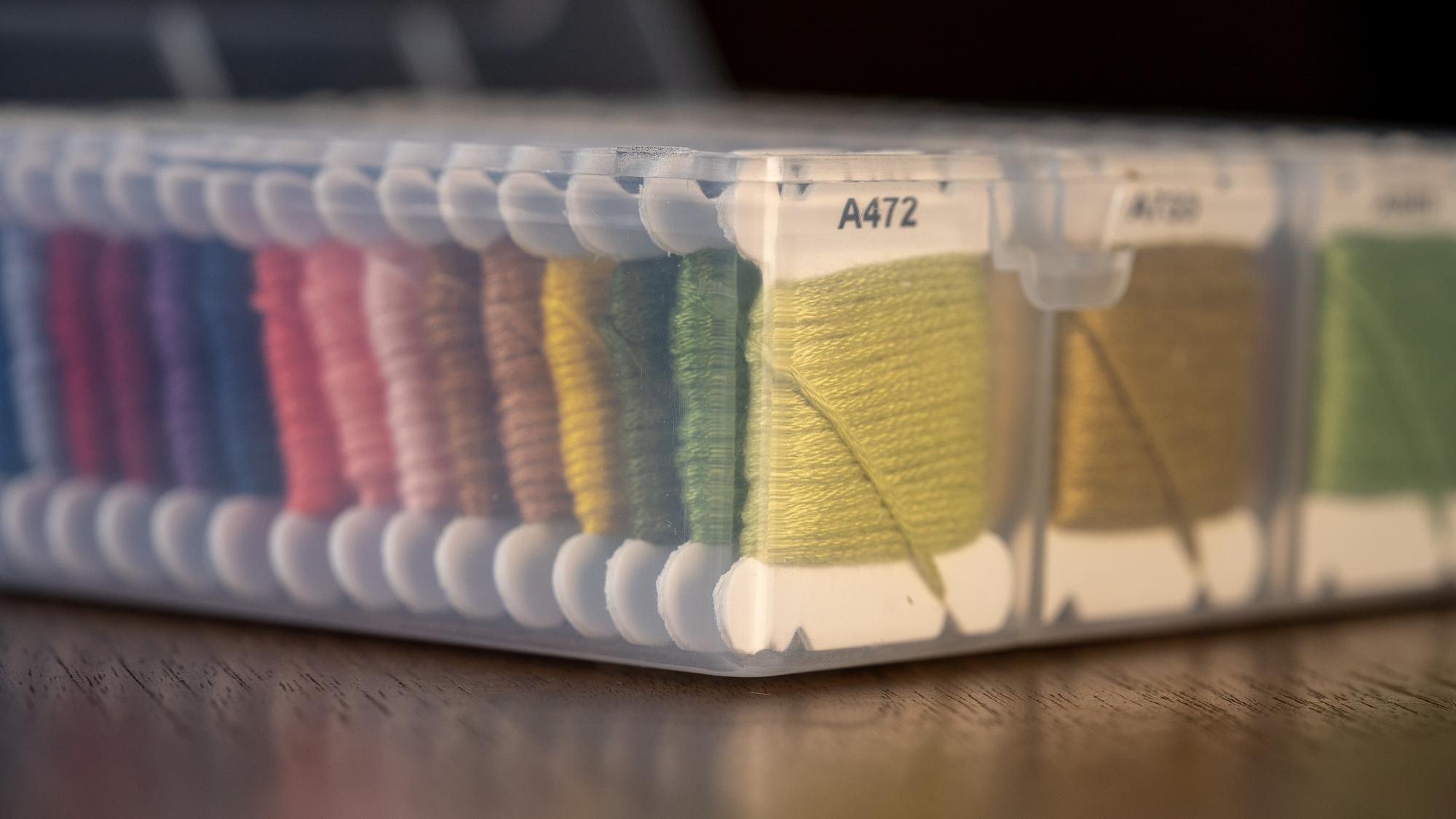 Three sample embroidered swatches